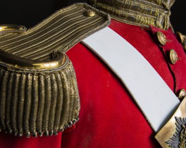 A uniform displaying the epaulette's and breast plate