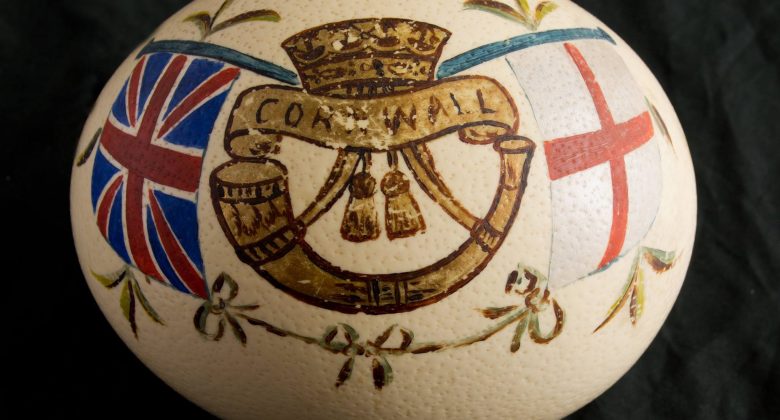 An Ostrich egg painted with the insignia of the Duke of Cornwall's Light Infantry