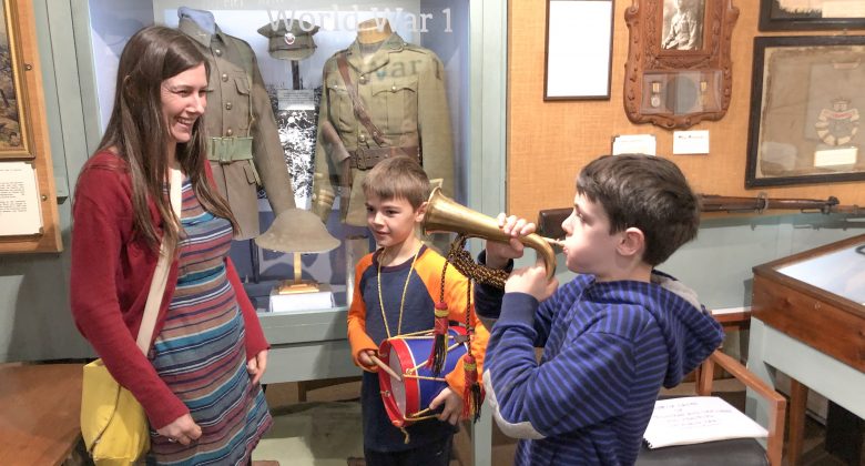 kids playing the instruments in Cornwalls Regimental Museum, Bodmin Keep