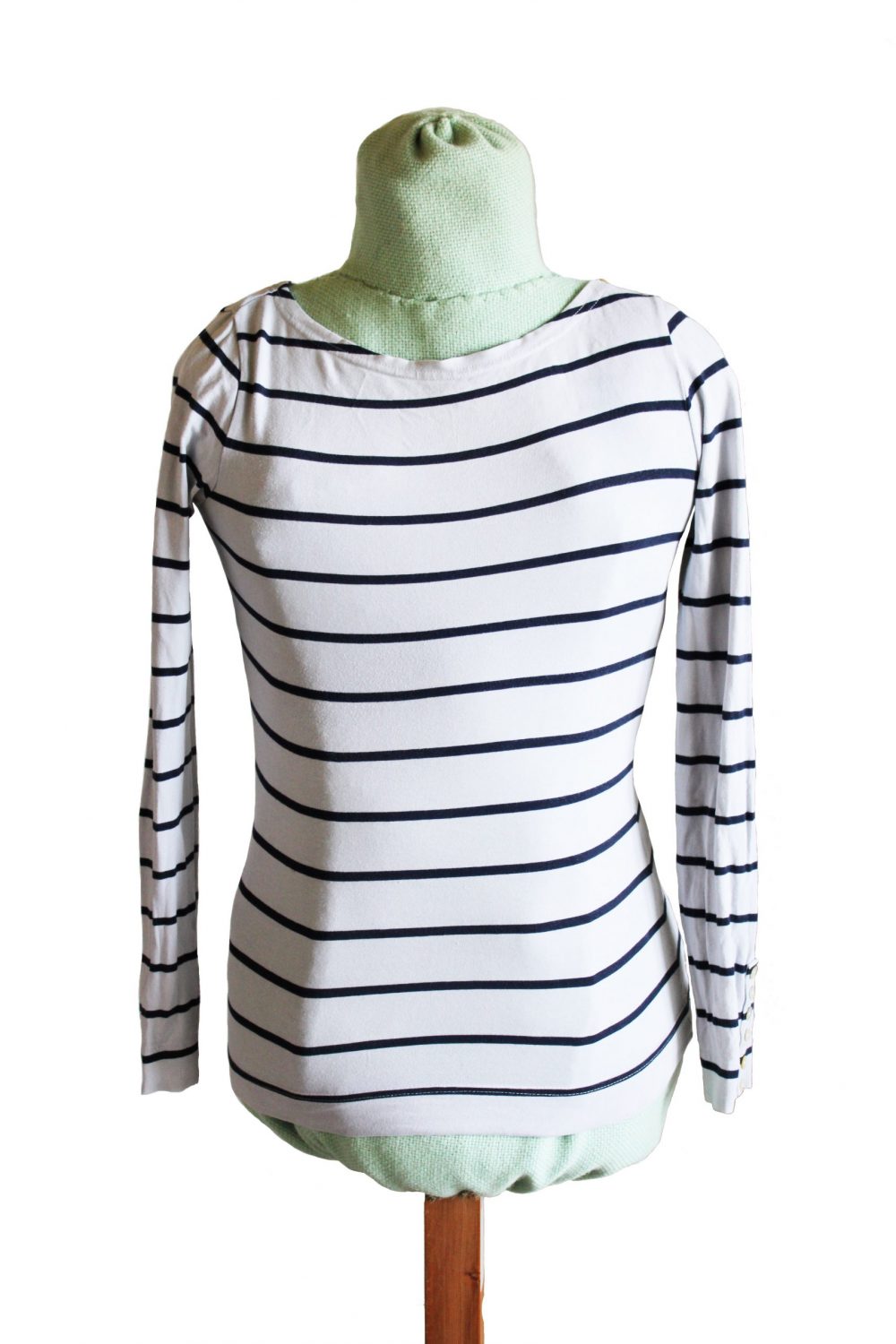 White long sleeved top with dark blue horizontal stripes