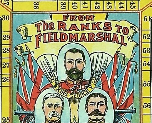 Picture of the centre of the board game showing the heads of three Field Marshals - King George V, Sir John French, Earl Kitchener.
