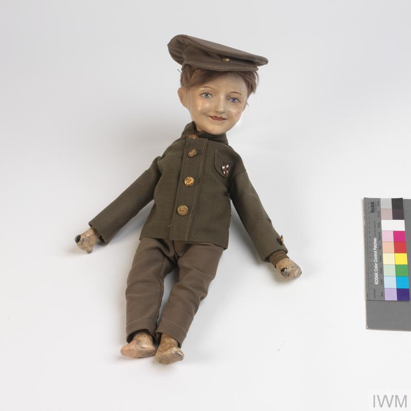 Wooden doll in a soldier's uniform from the First World War.