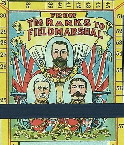 Picture of the centre of the board game showing the heads of three Field Marshals - King George V, Sir John French, Earl Kitchener. 